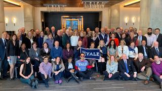 Current and former members of the YAA Board of Governors gather in New York City in February 2019.