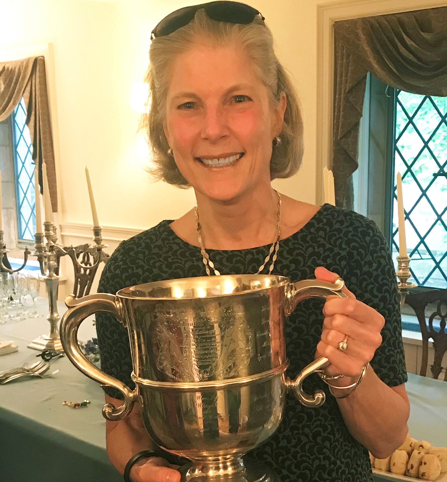 Andrea DaRif '73 last semester holding the Tyng Cup intramural trophy, at Saybrook College