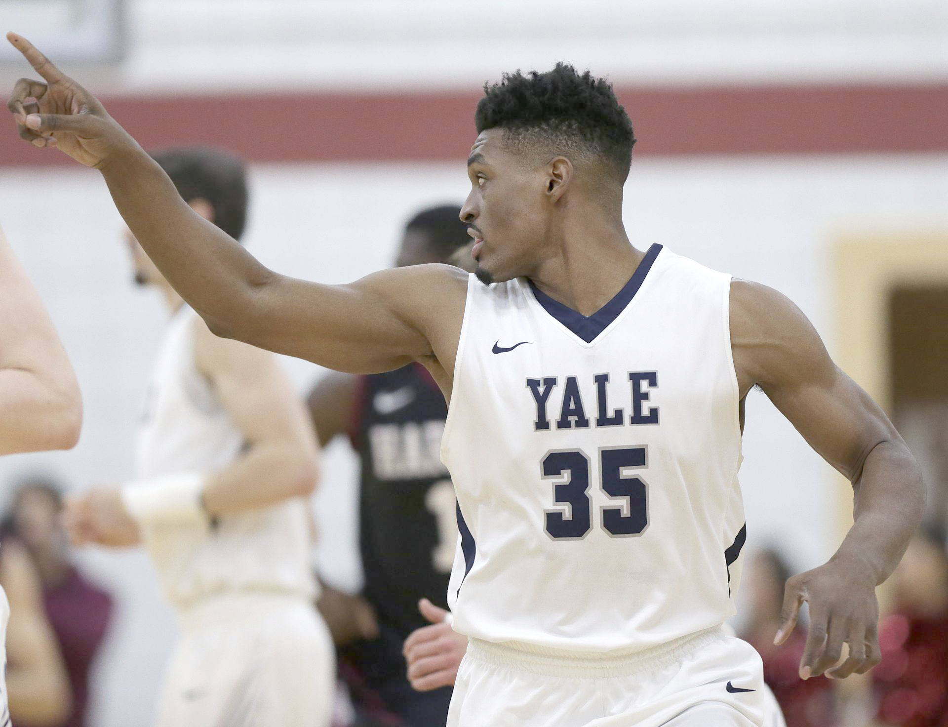 Brandon playing basketball for Yale