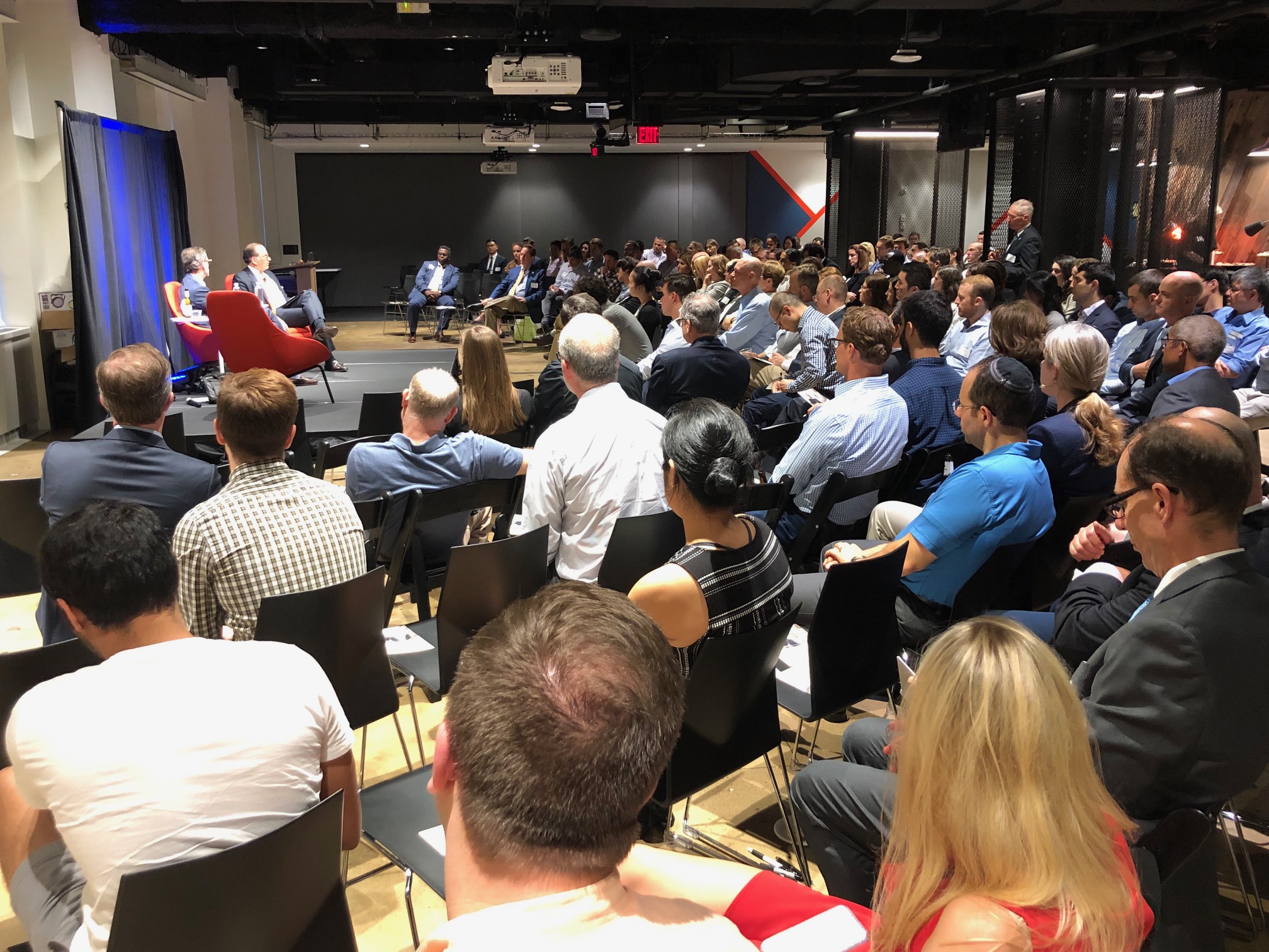 Yale and Princeton alumni at the YaleFin quantitative finance roundtable hear from Mark Carhart ’88, chief investment officer at Kepos Capital, and Jeffrey C. Wecker (Princeton ’84), partner and chief data officer at Goldman Sachs. Photo: Henry Kwan