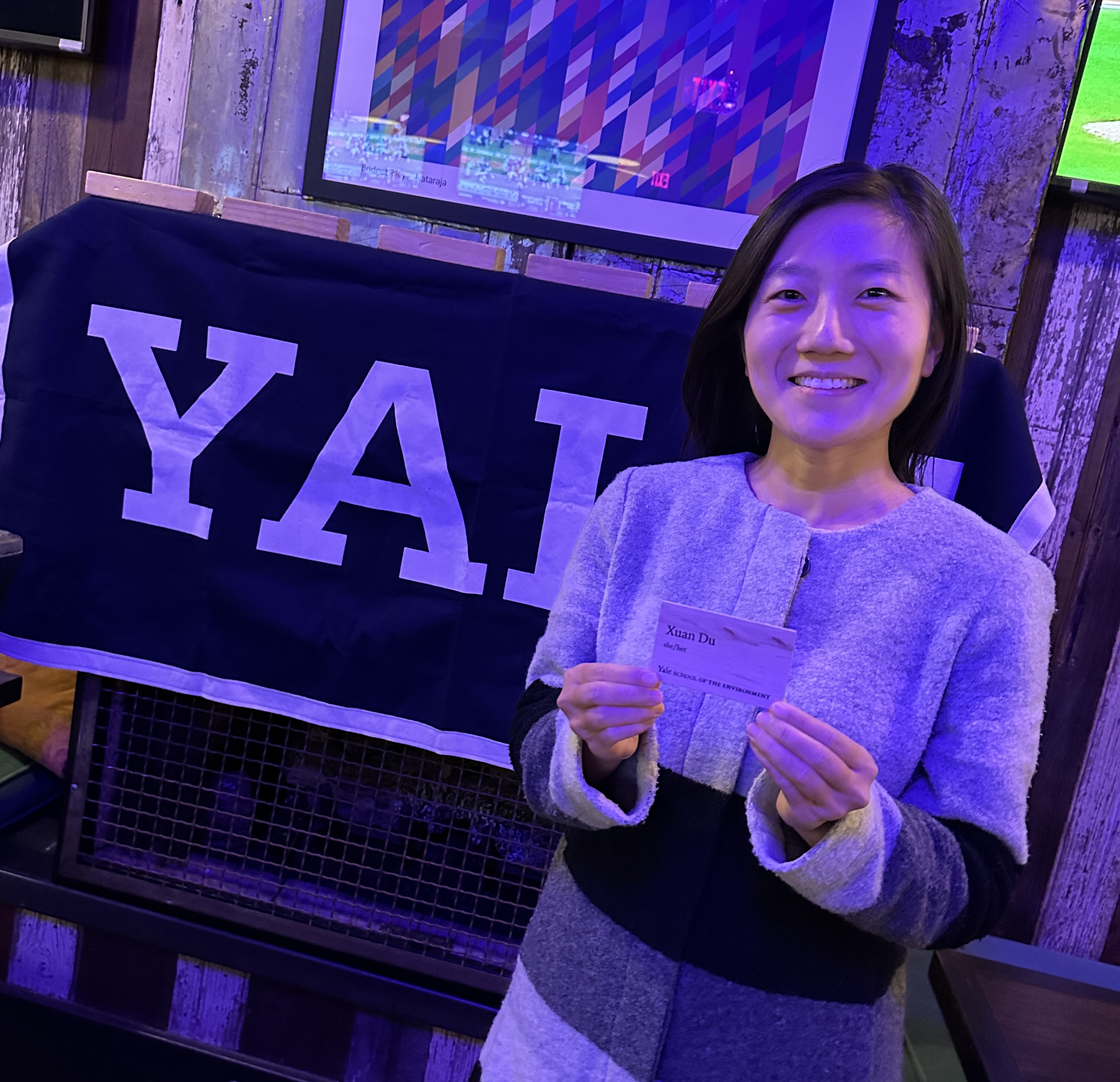 Xuan Du ’22 MEM shows off her sustainable, reusable name tag at BOLD night in Washington, D.C.