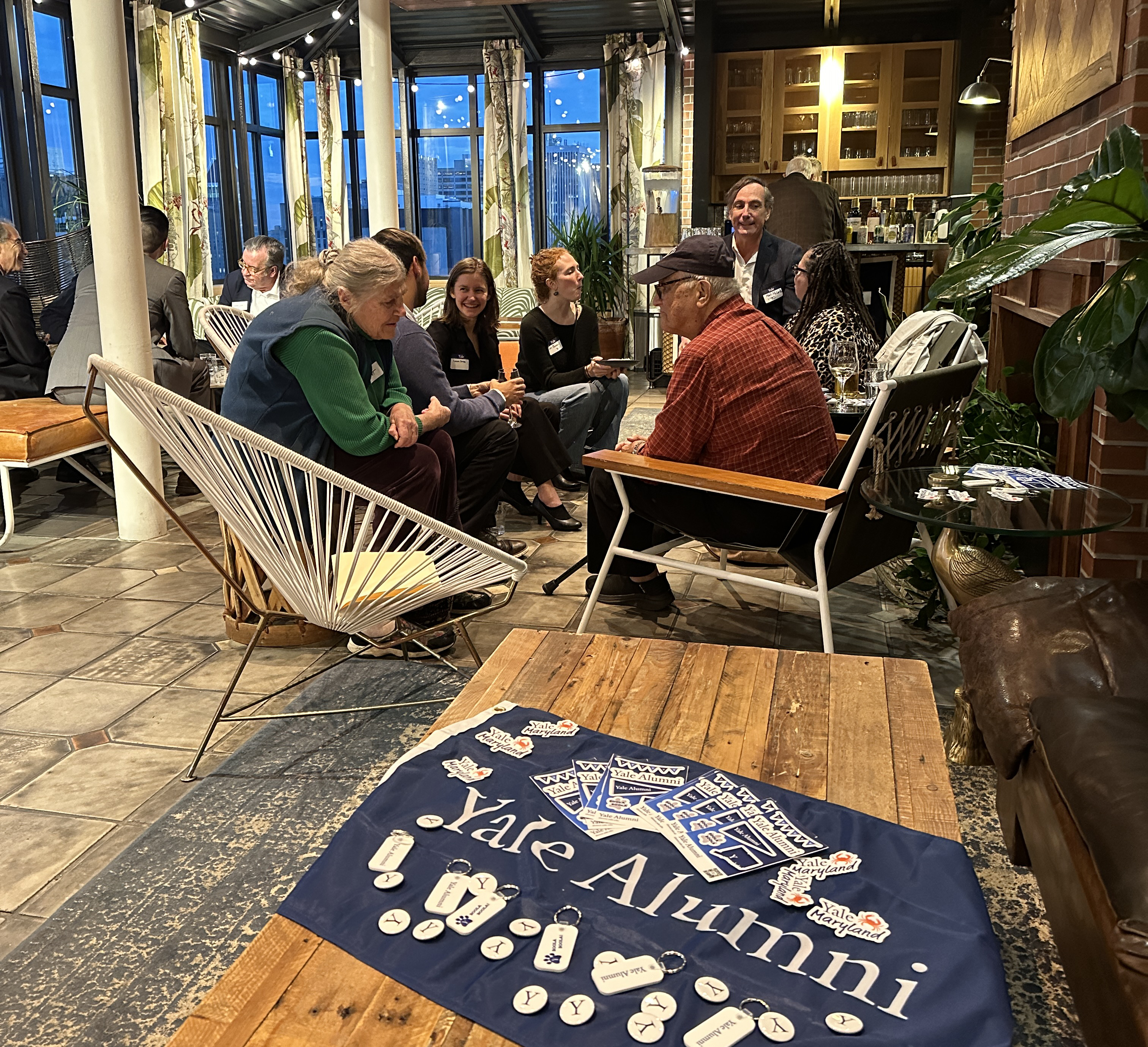 Yale alumni and family enjoy an evening of conversation during a happy hour in Baltimore, MD