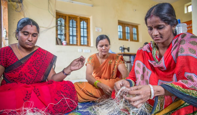 Local women making reusable pads