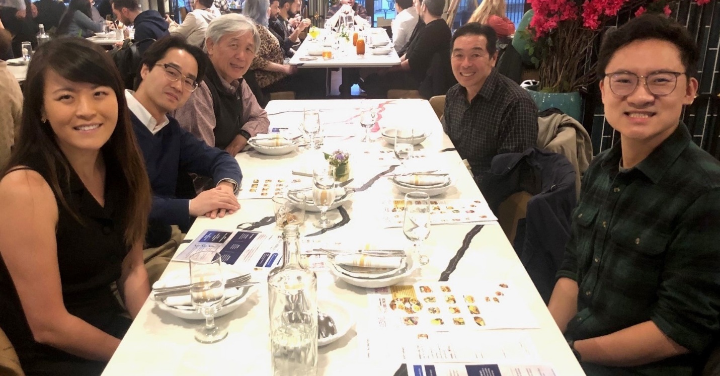 A group of people sitting at a long table
AI-generated content may be incorrect.