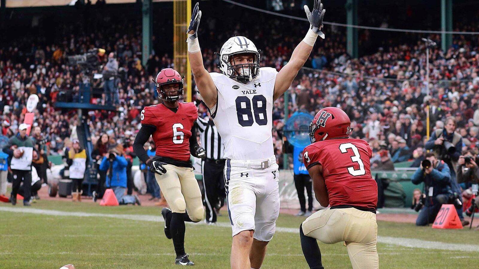 Yale football playing signaling a touchdown