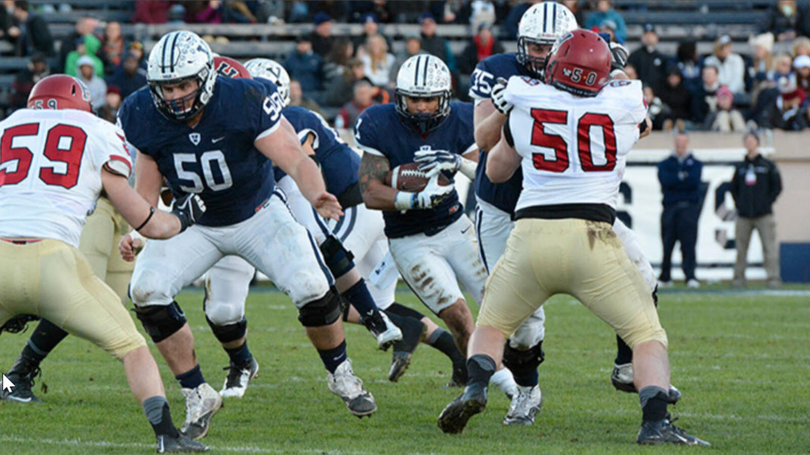 Yale vs Harvard playing football