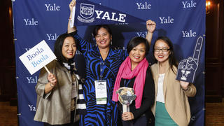 Alumni posing at the Yale photobooth