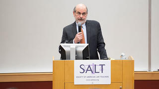 Yale Law School Professor Jim Silk ’89 JD accepts the M. Shanara Gilbert Human Rights Award from the Society of American Law Teachers (SALT). Photo by Kyle Encar.