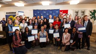 The 2018 YAA Board of Governors Excellence Awards winners gather for a group photo.