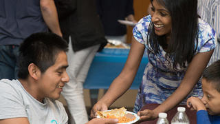Krish Vignarajah ’01, ’08 JD with the LIRS's Respite and Welcome program in New Mexico.