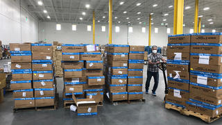 Donated materials being processed at YNHHS’s Regional Operations Center in West Haven. Photograph courtesy of YNHHS.