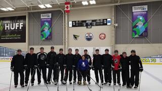 Maria Dennis '88 with officials in the NHL bubble during the 2020 NHL playoffs