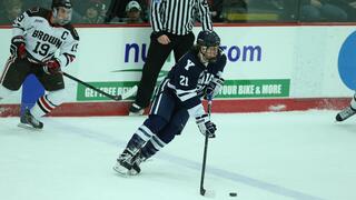 Photo of John Hayden ’17 playing hockey