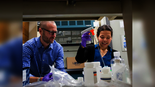 Photo of Yasmmyn Salinas ’19 PhD in a lab