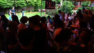 Photo of Yalies at a barbeque 