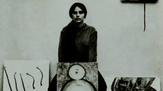 Sculptor Eva Hesse, who received a BFA from Yale in 1959, with her work.