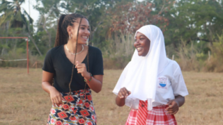 Nadja Umlauf ’22 (left) and a student from Mombasa, Kenya.