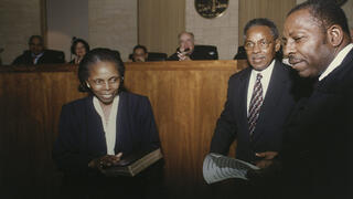 Inez Smith Reid ’62 LLB (left) and George Bundy Smith ’59, ’62 LLB (center) at Judge Reid’s confirmation ceremony.