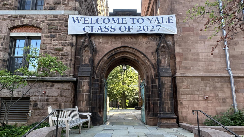 Welcome Class of 2027 banner on Old Campus gate