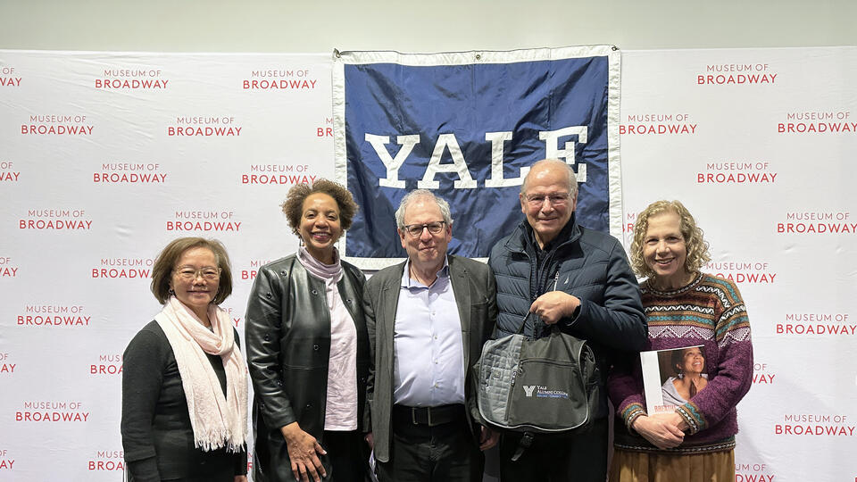 Dr. Muhammad (second from left) with YAA Executive Director Weili Cheng ’77 and members of the YACOL Board