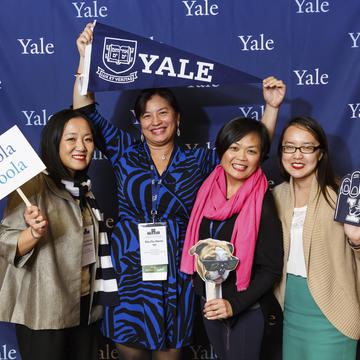 Alumni posing at the Yale photobooth