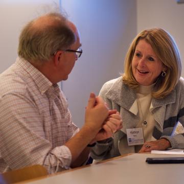 Students hold a discussion during a Yale Alumni College class.