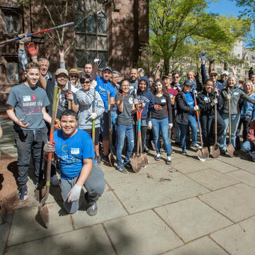 Yale Day of Service volunteers gather during their service project near Old Campus in New Haven.